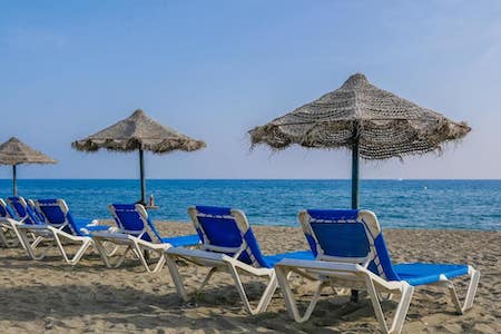Relax on the beach in front of the hotel