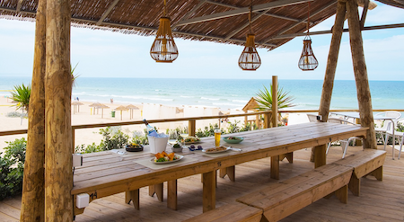 Sit for a while at Aroeira Beach Bar