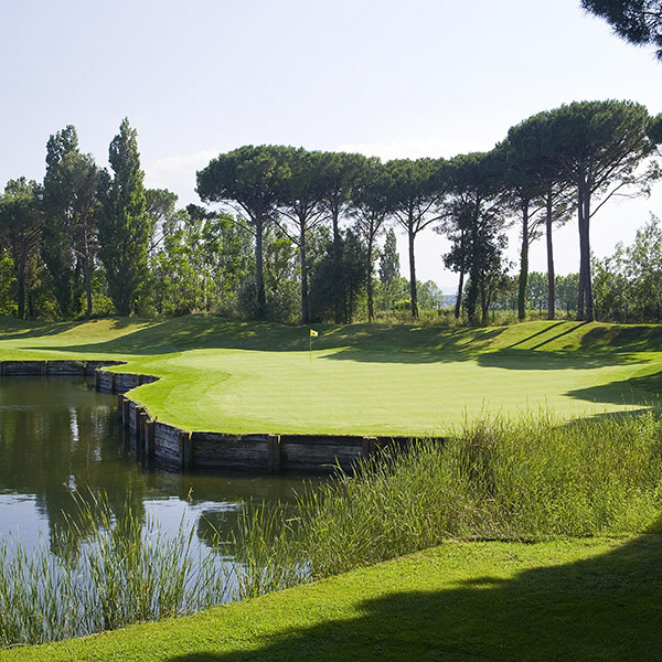 6th green with water on left at Emporda Golf, Costa Brava