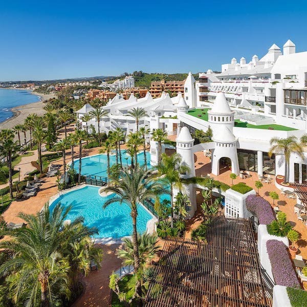 View of pool and sea and H10 Estepona Palace Hotel