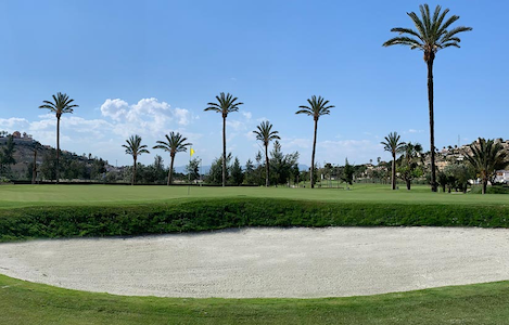 A large bunker guards this green at La Marquesa Golf