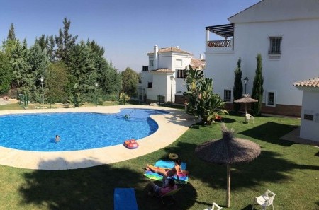 Pool area at Lauro Golf Apartments