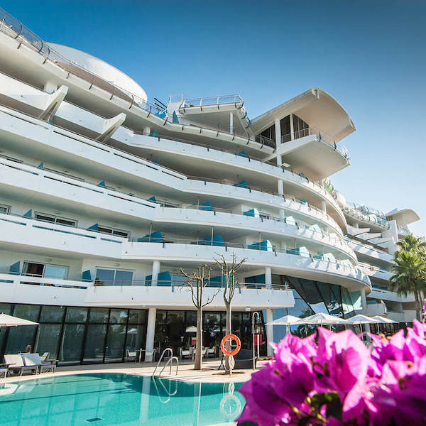 Senator Banus Hotel with bougainvillea in foreground